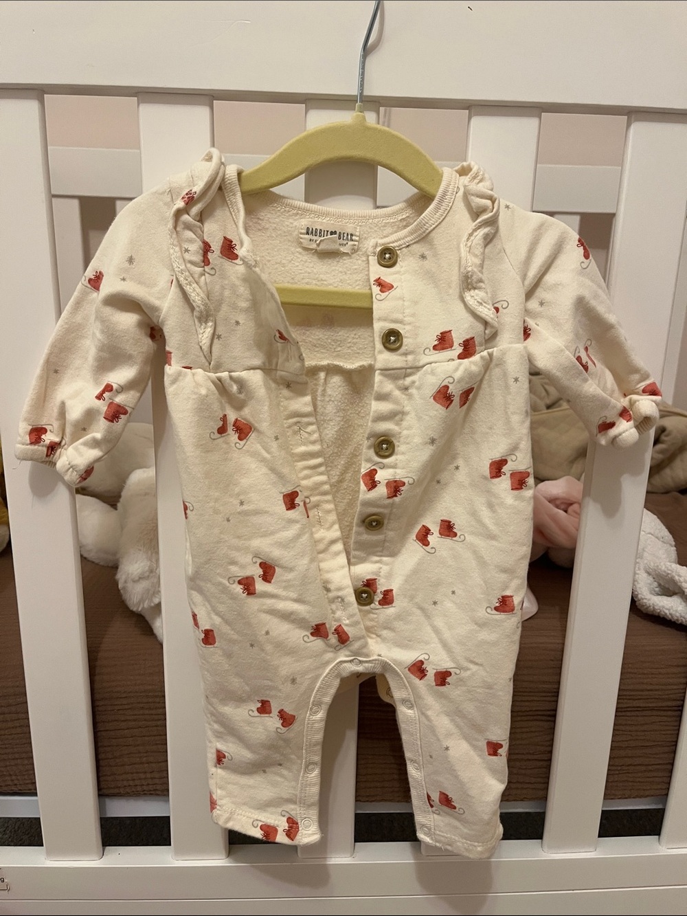 Rabbit + Bear Cream Footed One-Piece with Red ice skate Print